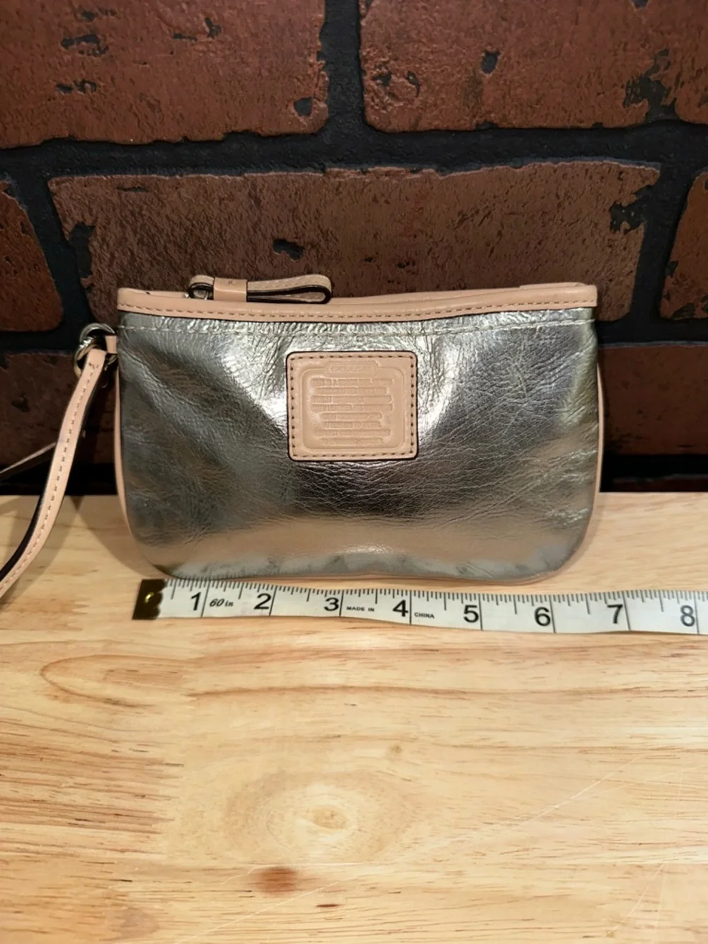 Coach Silver Metallic Wristlet with Nude Trim